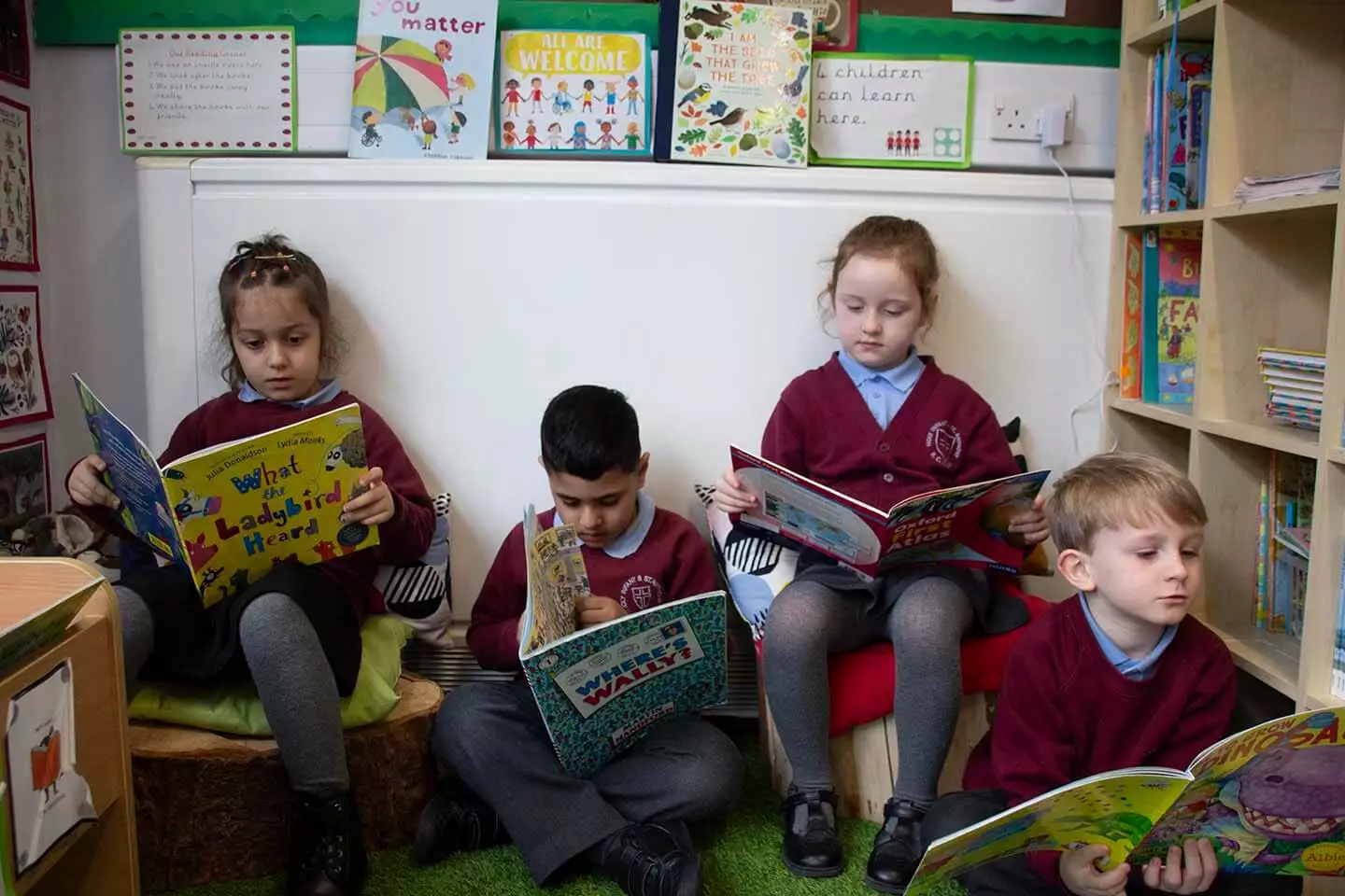Children reading in library